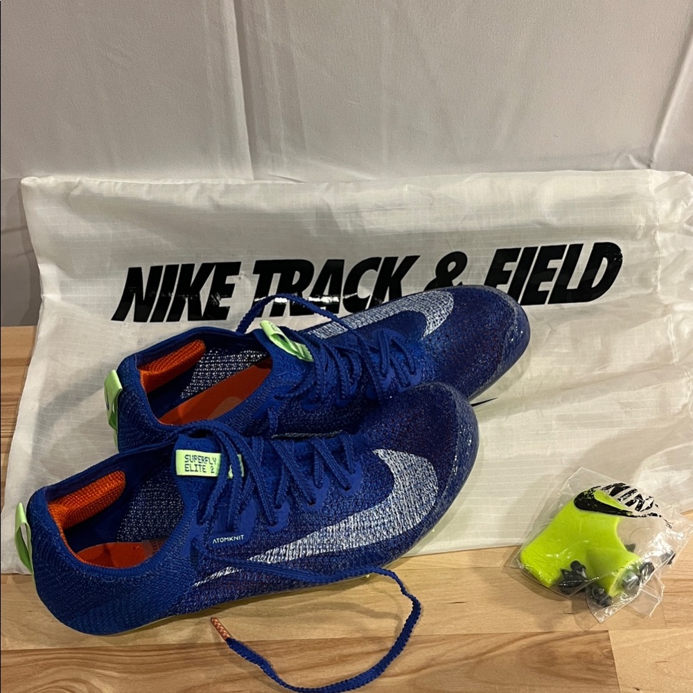 Nike Blue Racing Spikes with Neon Green Accents